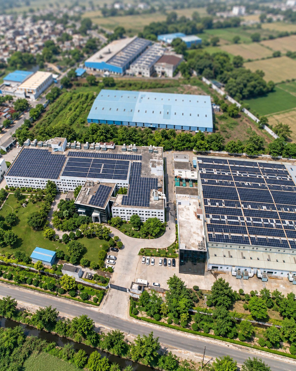 The AFPL campus from above, with rooftop solar and green cover