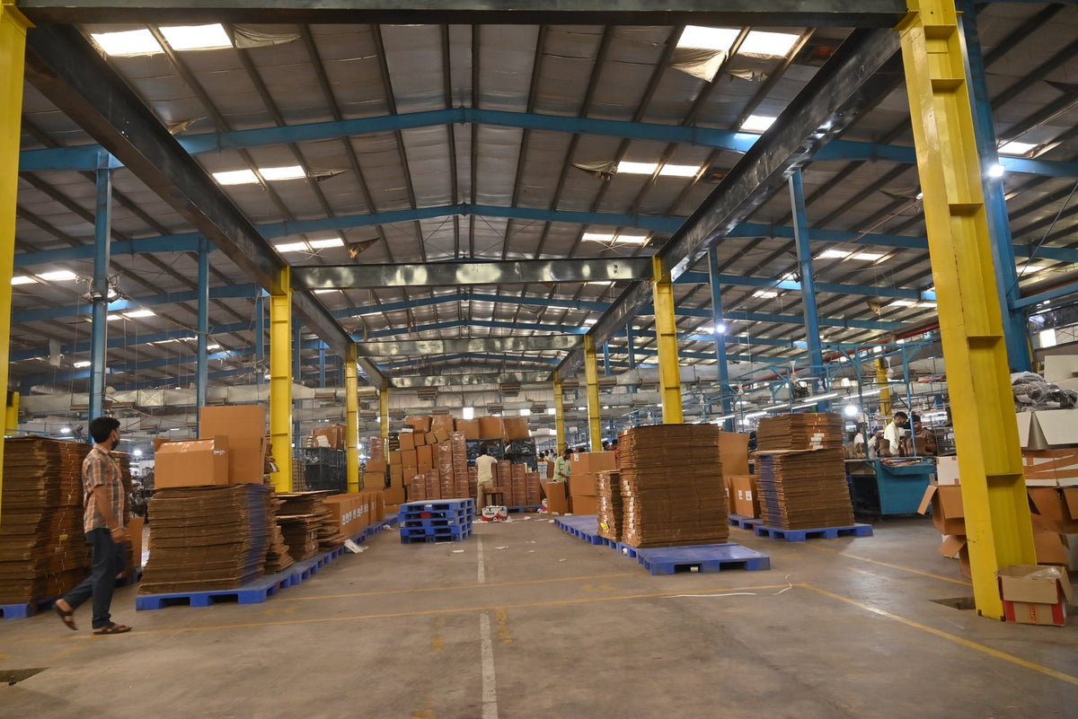 Cartons and pallets staged across the AFPL warehouse floor