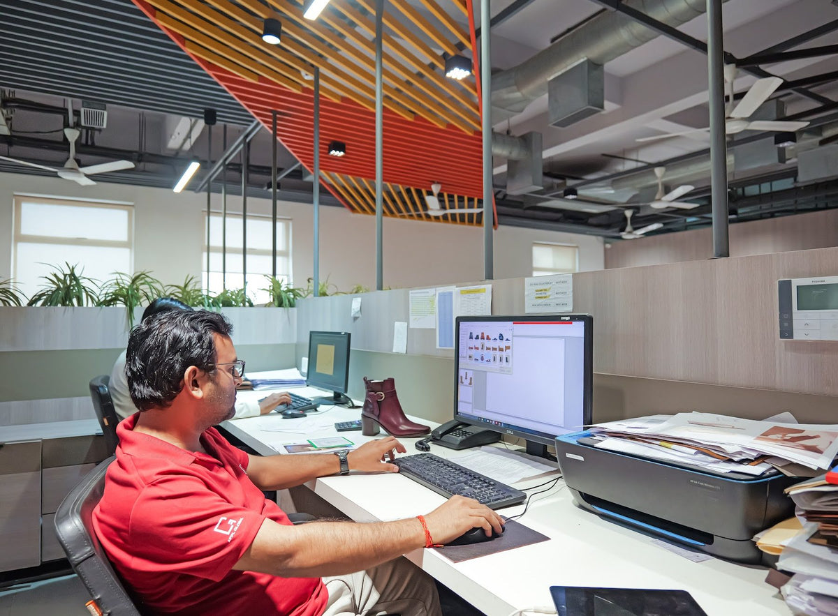 Designers at their workstations in the AFPL Product Creation Centre design studio