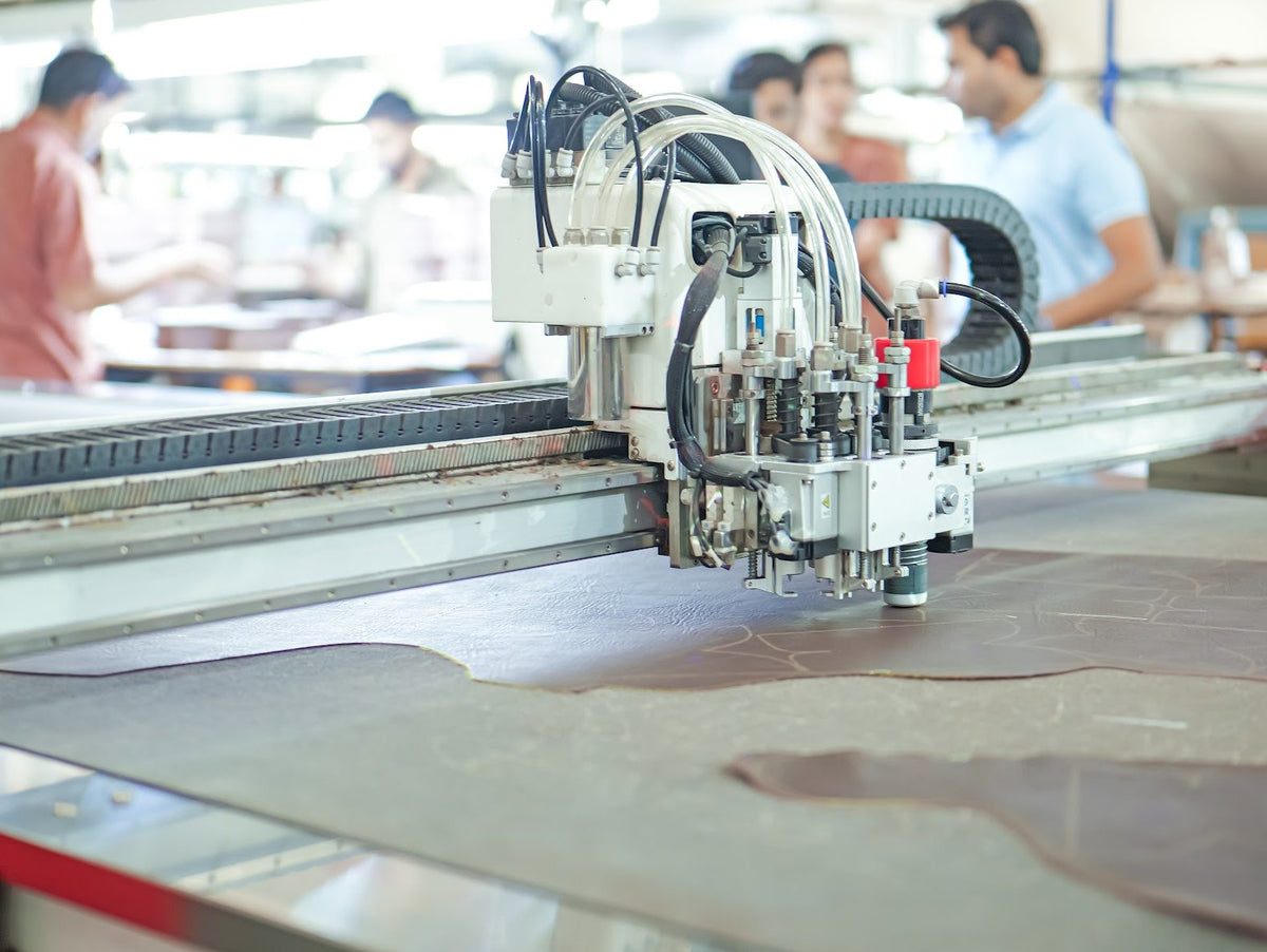 A dieless cutting head cutting leather on the AFPL floor