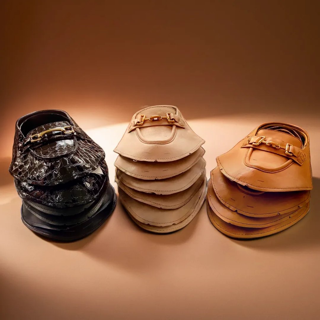 Stacked loafer uppers in patterned, natural and tan leather
