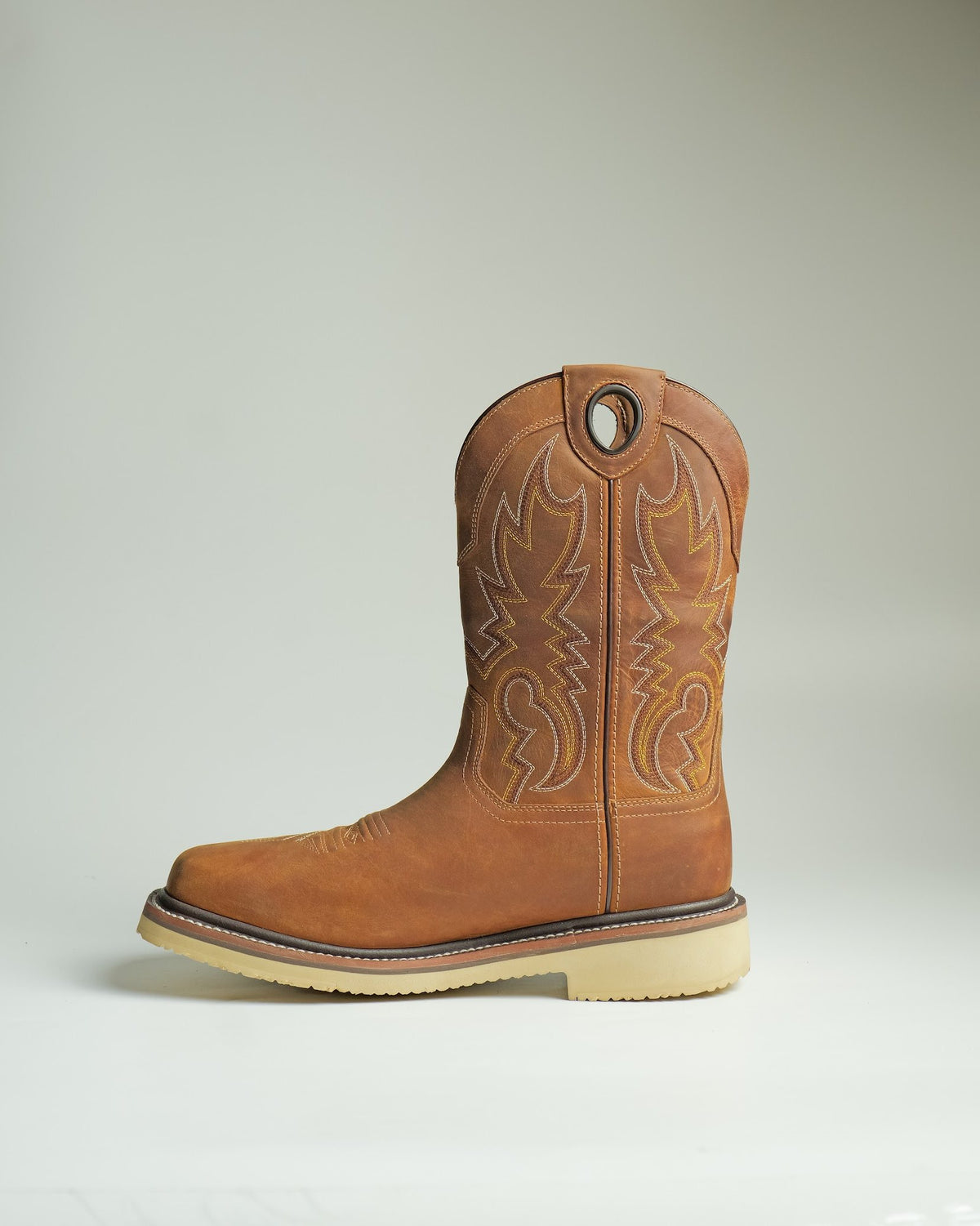 A tan work boot made by AFPL