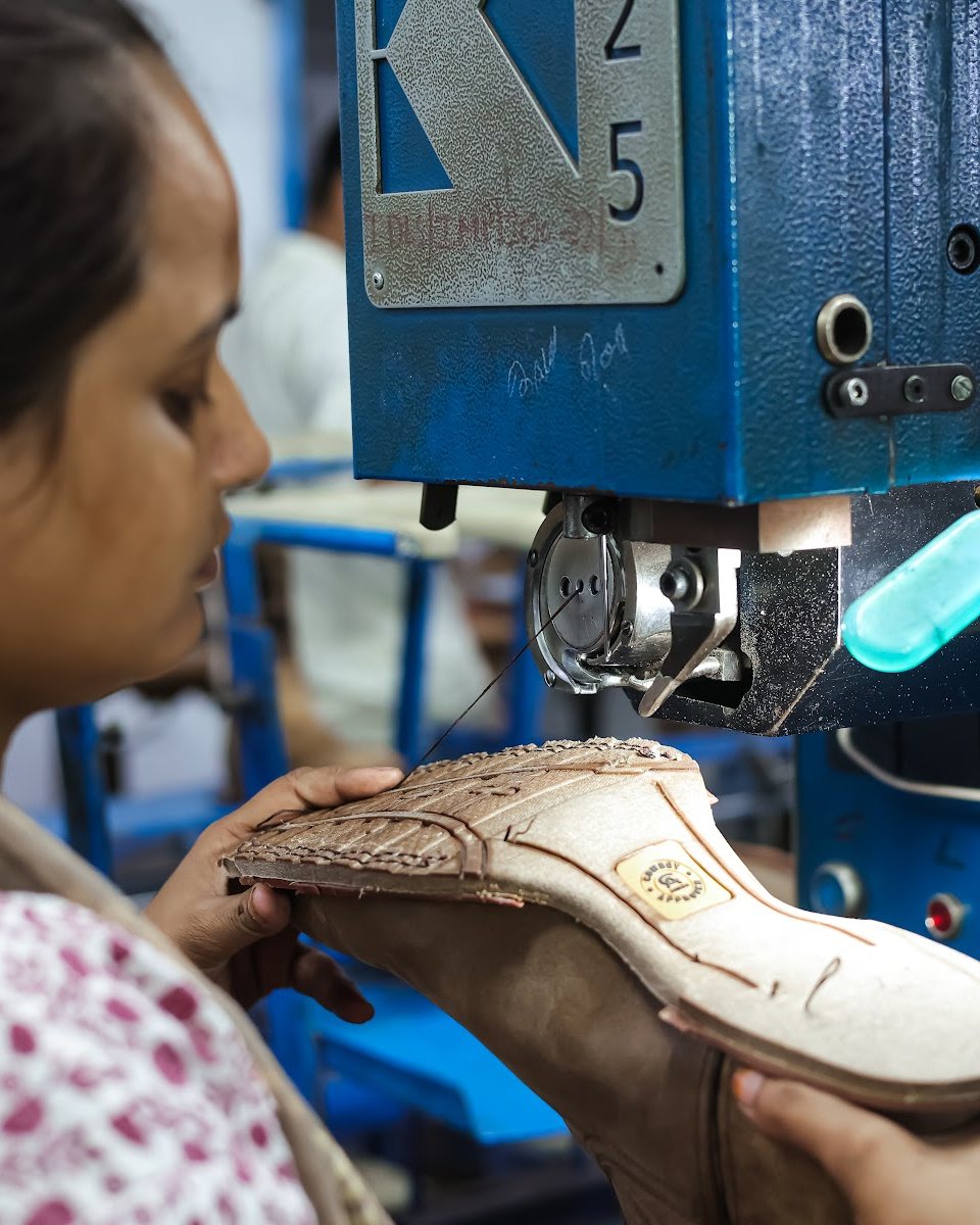 A Western boot at the Blake stitch machine on the AFPL line