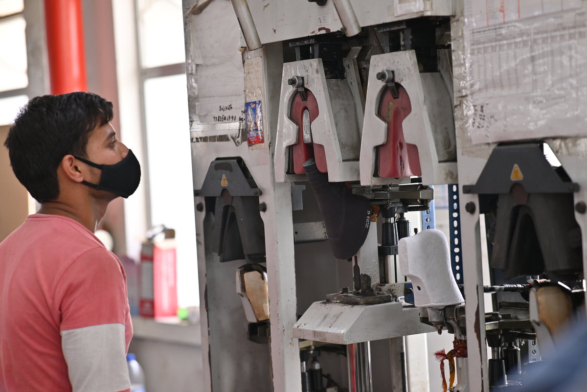 Goodyear welted sole being stitched on the line at AFPL Global, Kanpur