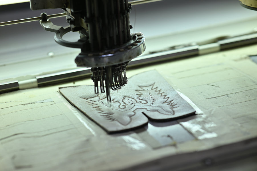 Programmed decorative stitching on leather at AFPL Global