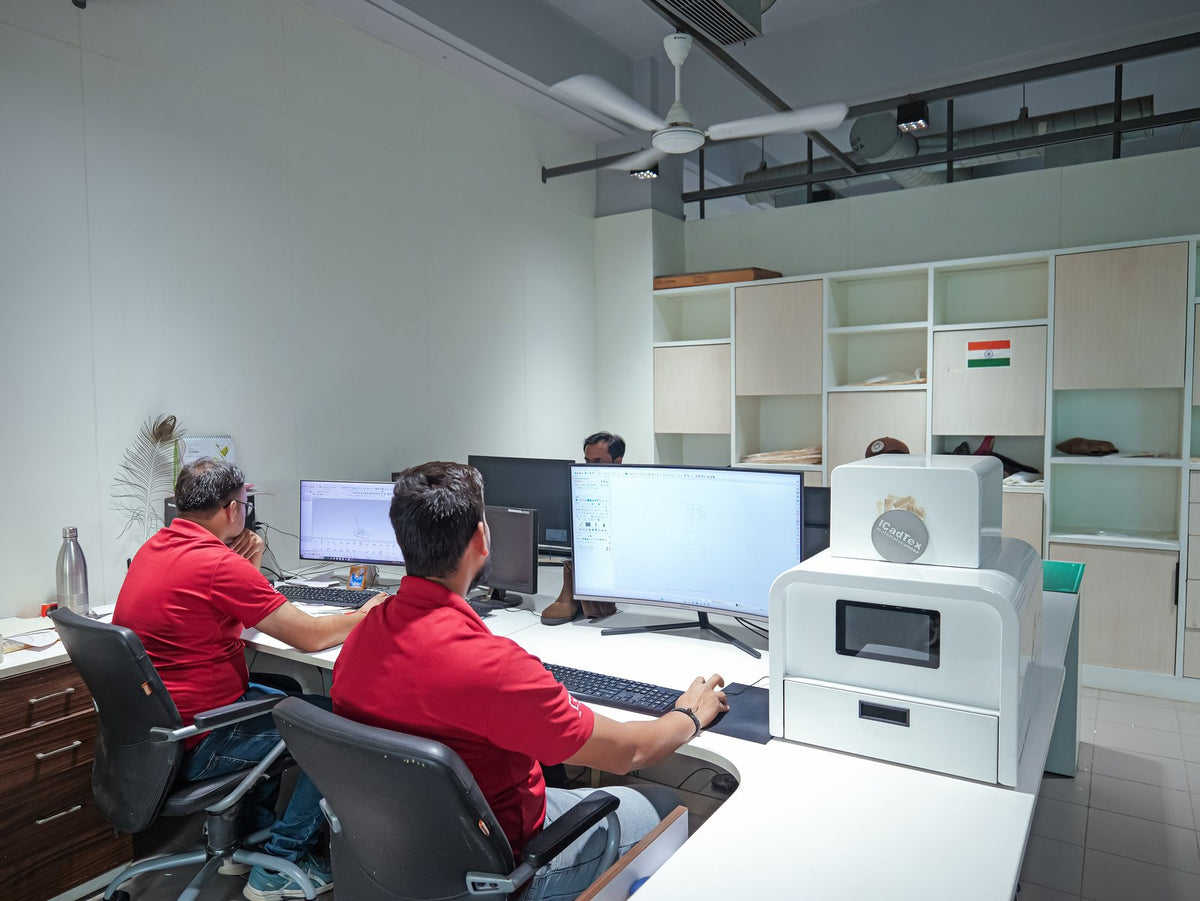 Designers at CAD workstations in the AFPL Product Creation Centre