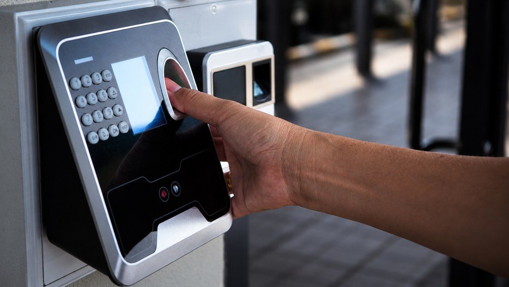A fingerprint reader controlling entry to a restricted area
