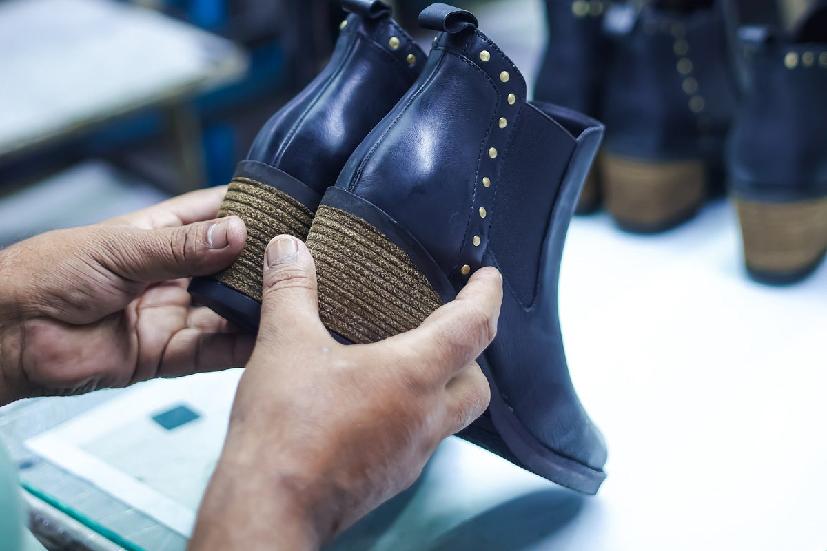 Finished ankle boots checked pair by pair