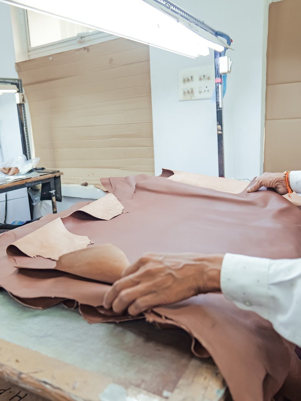 Hides checked by hand before production