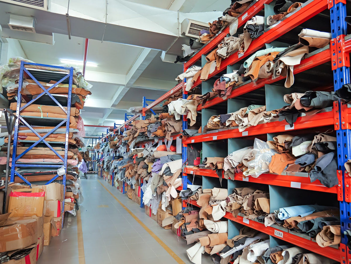 Leathers on tall racks in the AFPL material store
