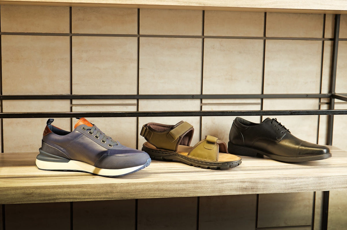 Men’s shoes from the AFPL range on a display shelf