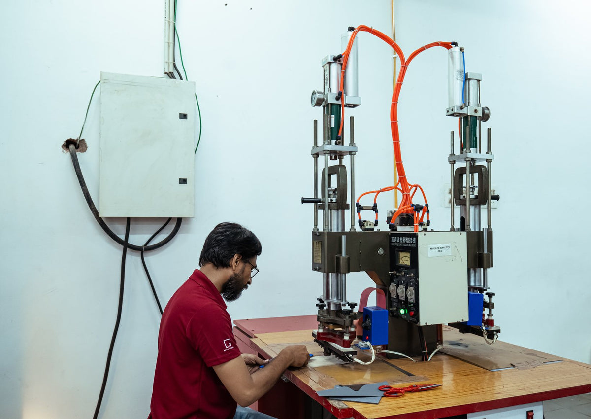 An operator at a welding machine