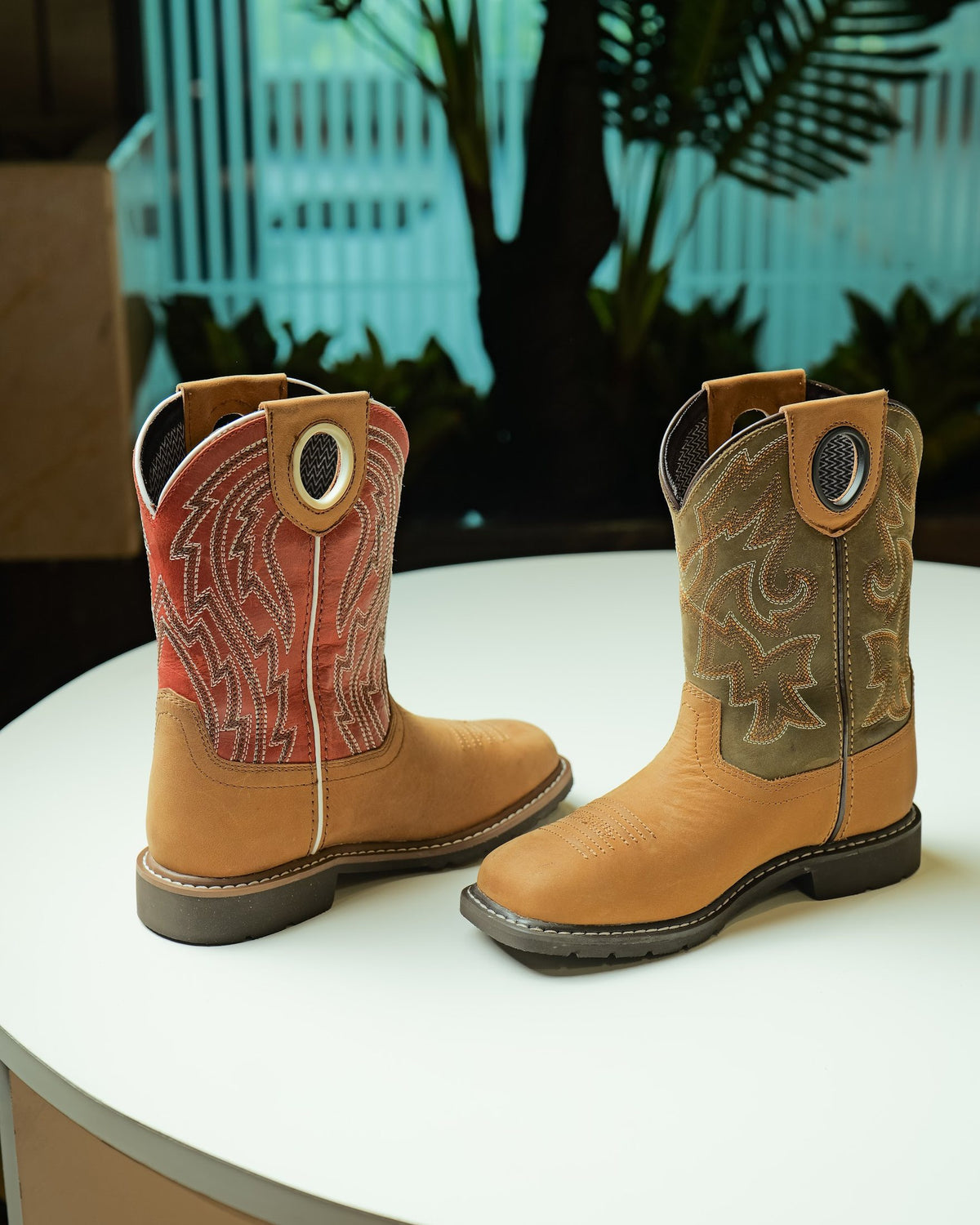 A pair of waterproof youth Western boots made by AFPL