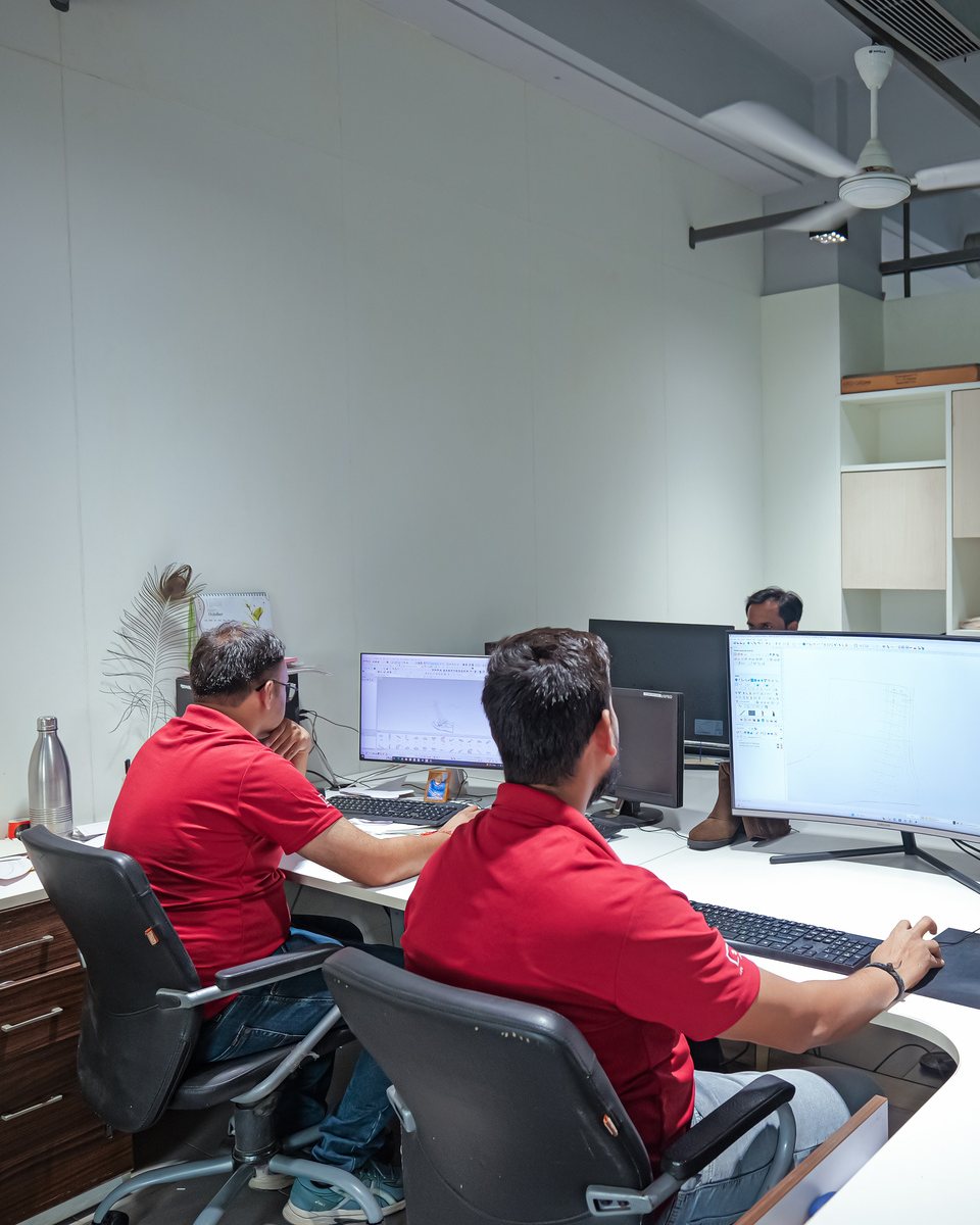 Pattern engineers at CAD workstations in the AFPL Product Creation Centre