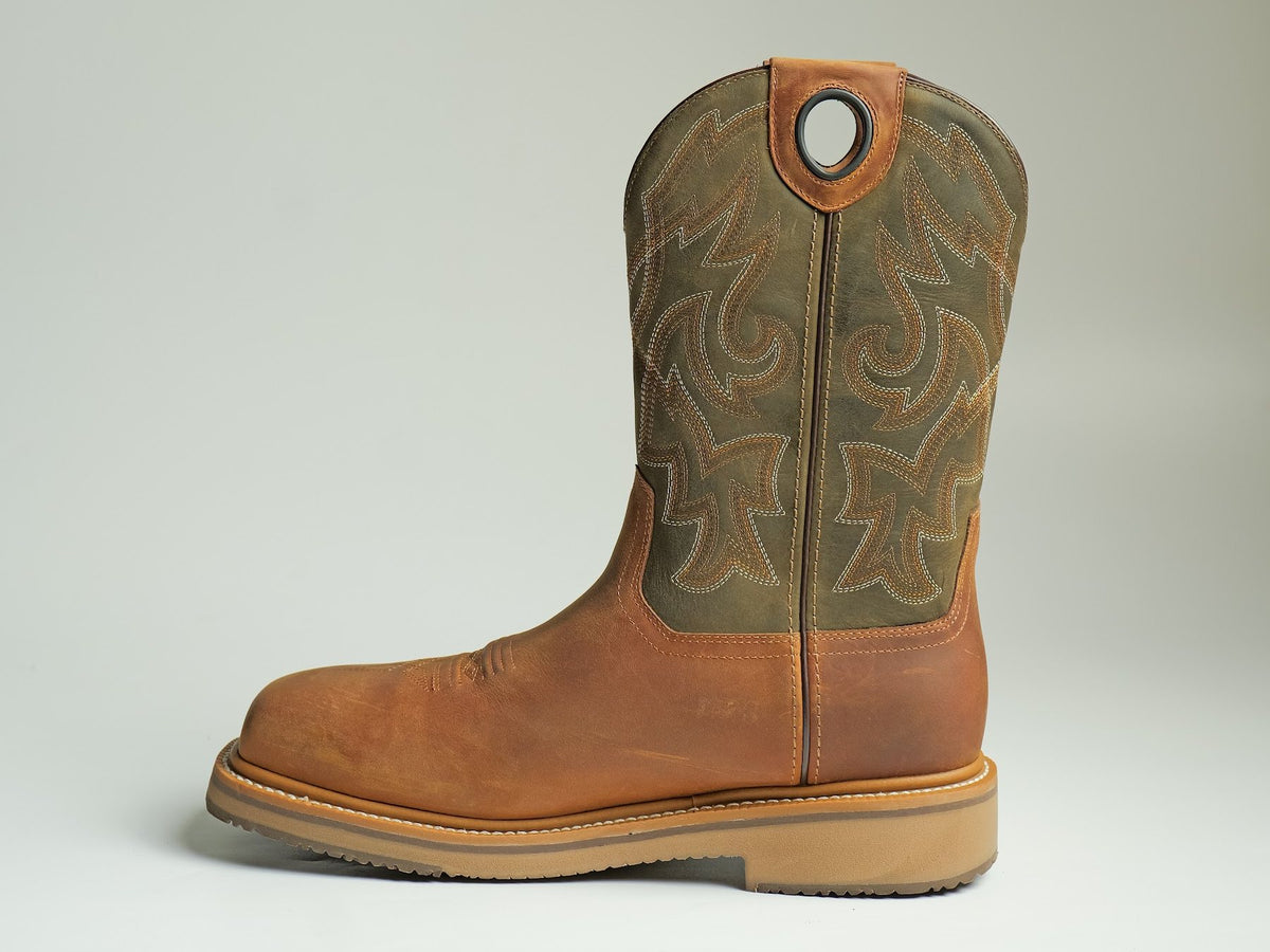 A waterproof pull-on work boot with an embroidered shaft