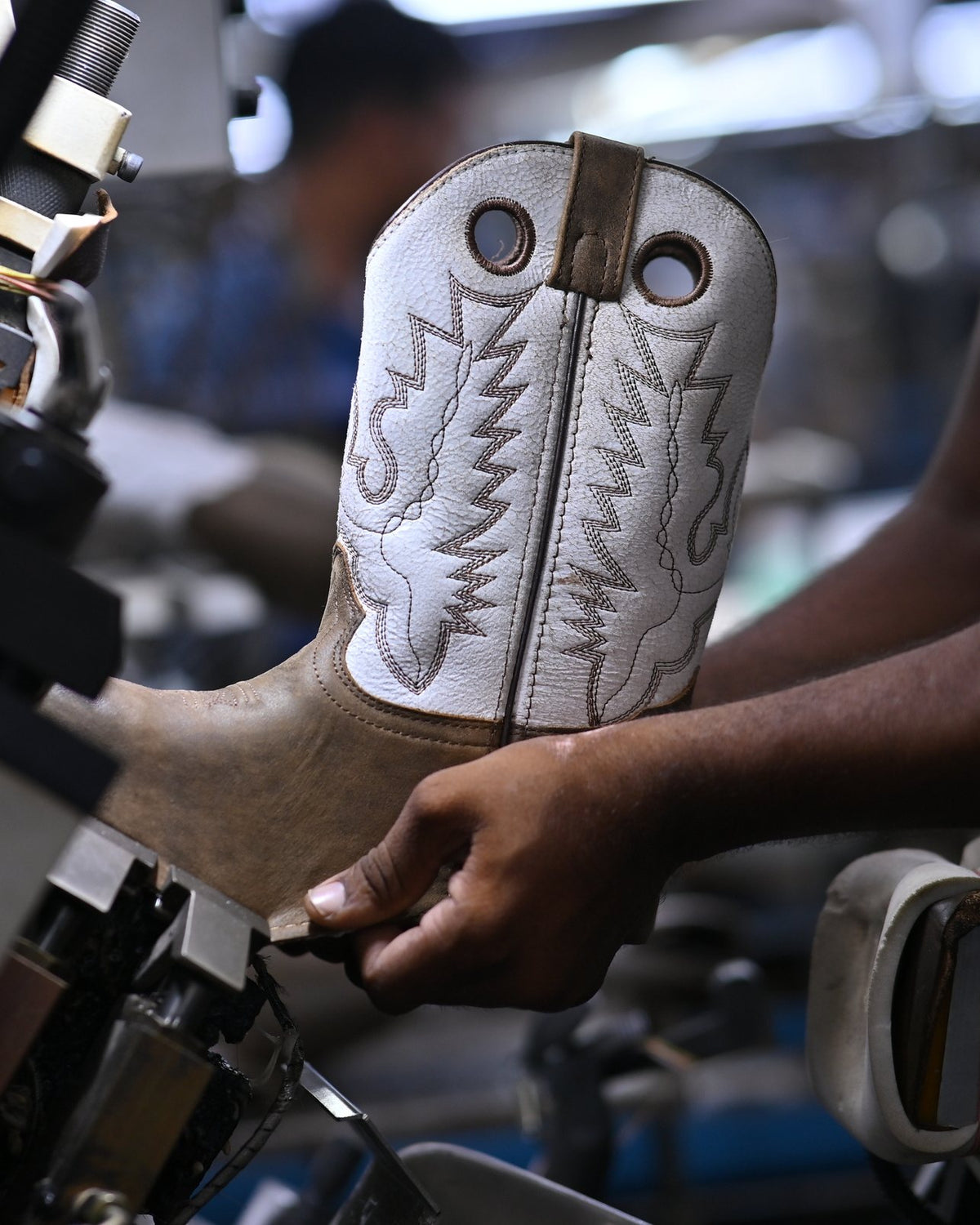 A Western boot being lasted on our production line