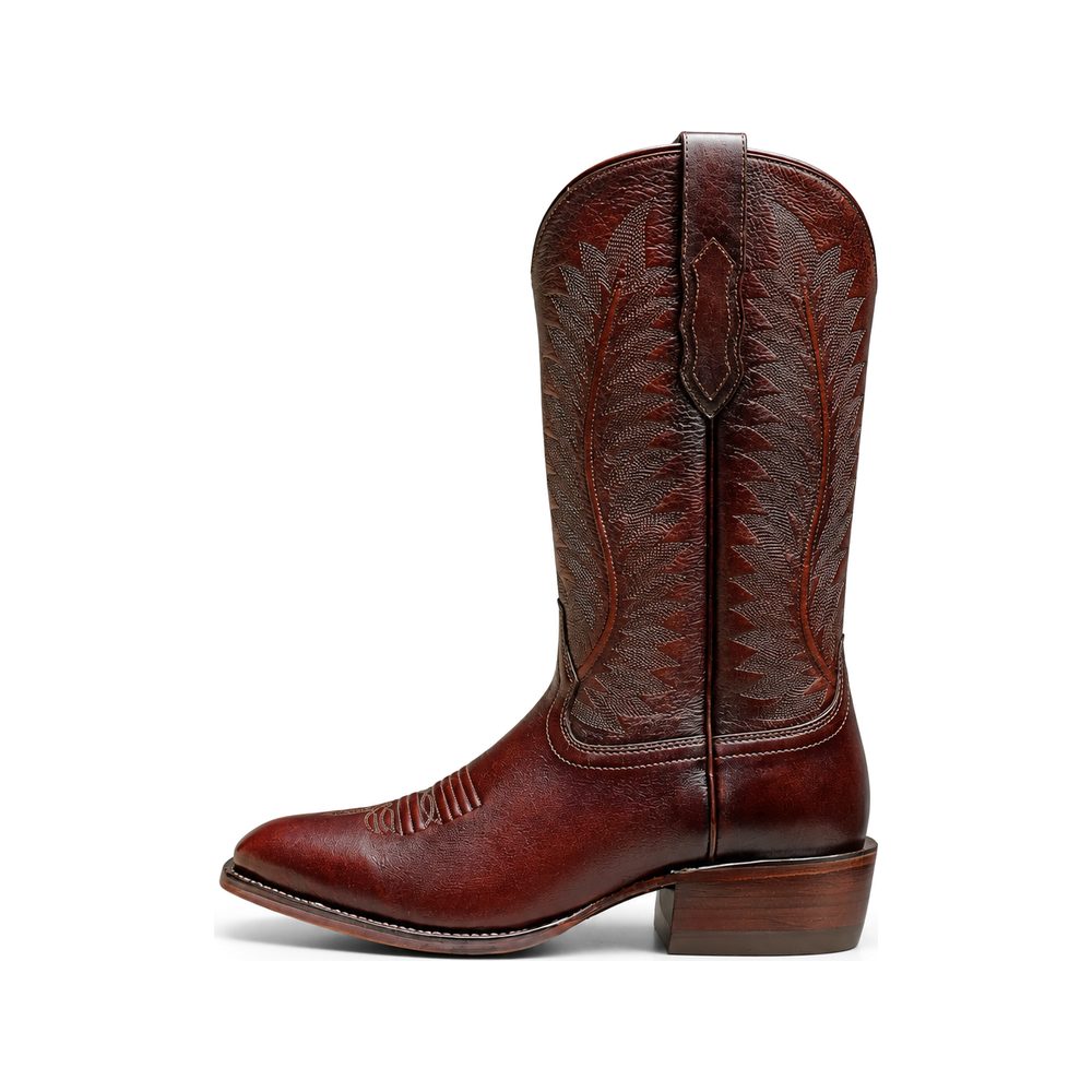 A Western boot with a leather sole and stacked heel